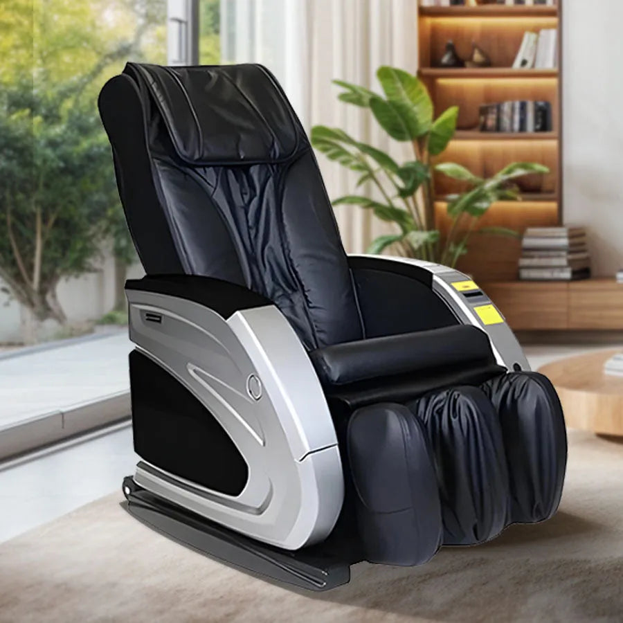 Infinity Share Vending Massage Chair IT-6900 in Silver and Carbon Fiber / Black Color; lifestyle image in a cozy room setup from Wish Rock Relaxation.