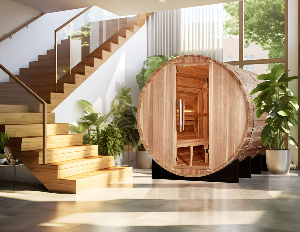 Golden Designs "Klosters" 6 Person Barrel Traditional Sauna in Pacific Cedar displayed in a sunlit modern interior from Wish Rock Relaxation