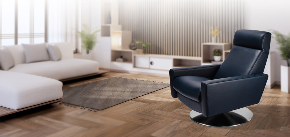 American Leather Comfort Air Cloud Echo Recliner in deep navy leather, showcased in a minimalist living room with light wood floors and modern white sectional from Wish Rock Relaxation