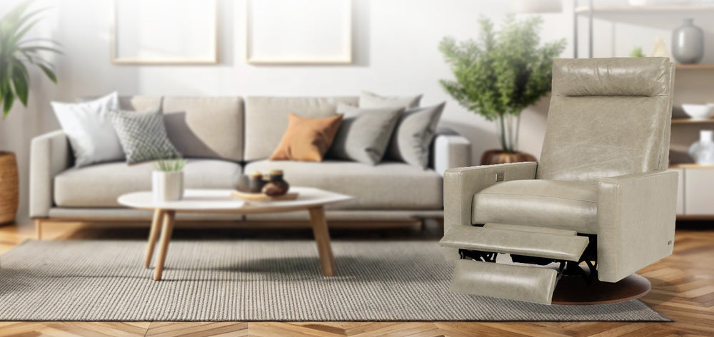 American Leather Comfort Air Cumulus Echo Recliner in light beige leather with extended footrest, displayed in a cozy modern living room with neutral décor and houseplants from Wish Rock Relaxation