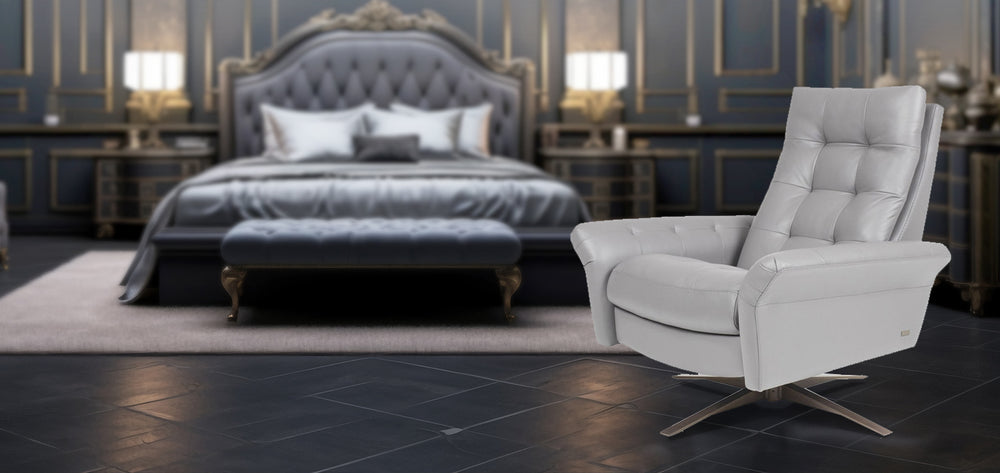 American Leather Comfort Air Pileus Echo Recliner in white leather, positioned in a luxurious bedroom with tufted bed and elegant décor from Wish Rock Relaxation