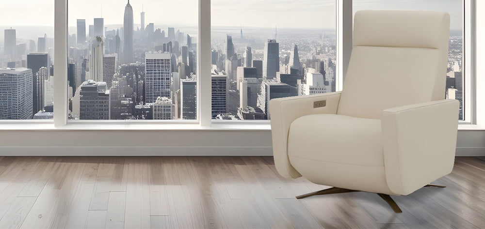 American Leather Comfort Air Cloud Solace Power Zero Gravity Recliner in ivory leather, set against a stunning city skyline backdrop with light wood flooring from Wish Rock Relaxation