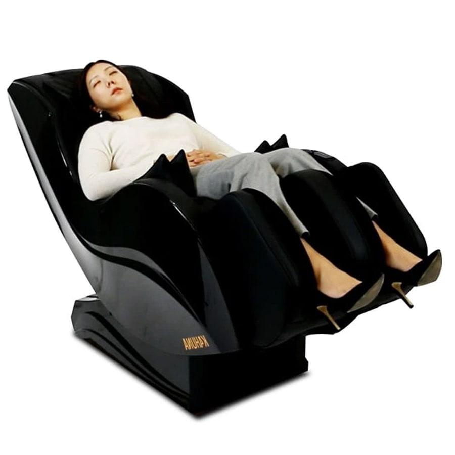 Kahuna HM-5000 Massage Chair with woman sitting and relaxing with eyes closed, featuring Wish Rock Relaxation lifestyle image