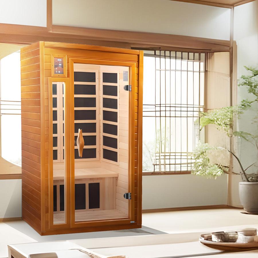 Dynamic Barcelona Elite 1-2 Person Ultra Low EMF FAR Infrared Sauna - Canadian Hemlock placed in a serene spa-style room from Wish Rock Relaxation.