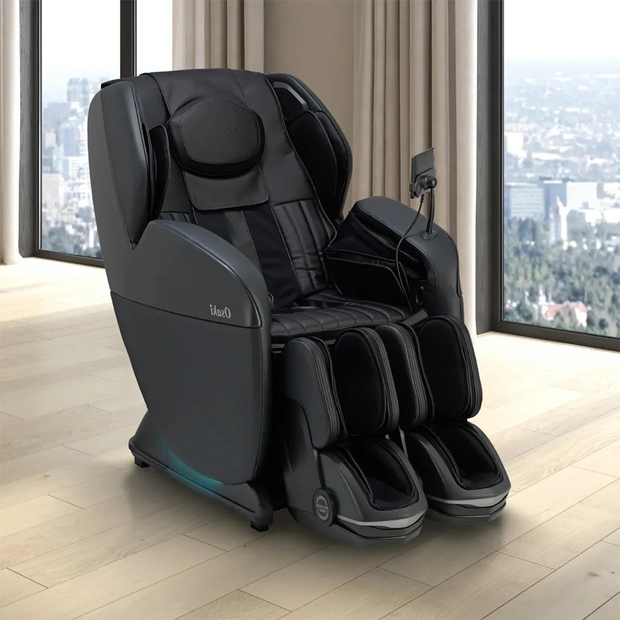 Osaki YogaFlex 4D Massage Chair in black placed by window with city view from Wish Rock Relaxation.
