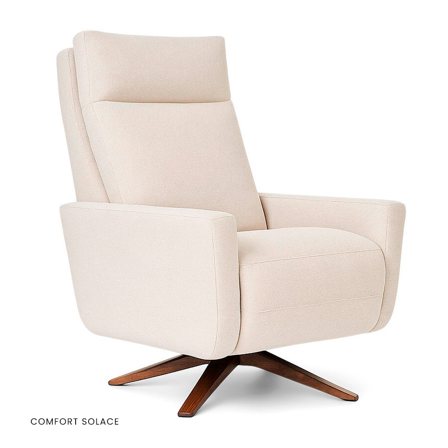 American Leather Cumulus Comfort Solace recliner in light pink with wooden four-star base.
