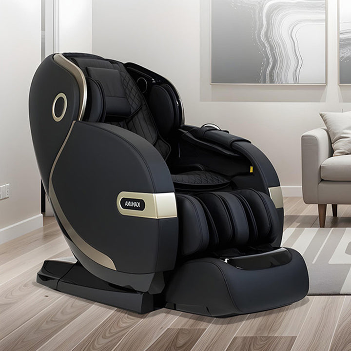 Kahuna SM-9300 Massage Chair in black with gold accents, showcased in a modern living room with neutral décor, wood flooring, and contemporary artwork from Wish Rock Relaxation