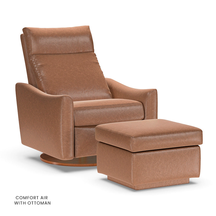 American Leather Ontario Comfort Air chair in tan with matching ottoman on wooden disc base.