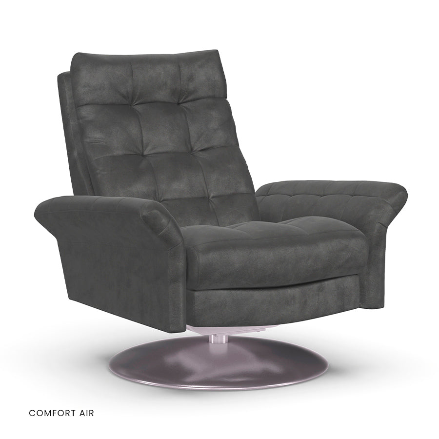 American Leather Pileus Comfort Air chair in dark gray with tufted back on disc base.