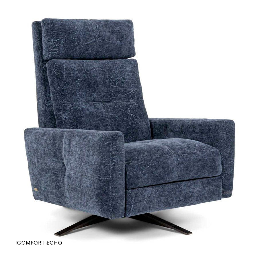 American Leather Rainier Comfort Echo recliner in blue with channel-tufted back on four-star base.