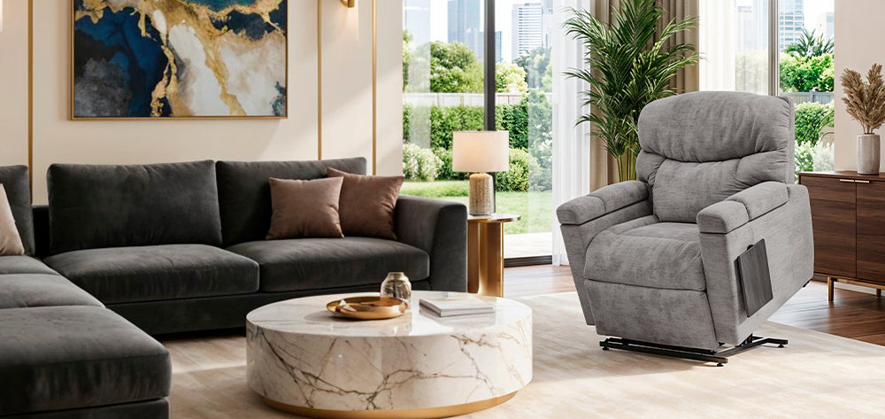 UltraComfort™ UC566 Maya Large 4-Zone Power Lift Chair in gray shown in a modern living room from Wish Rock Relaxation.