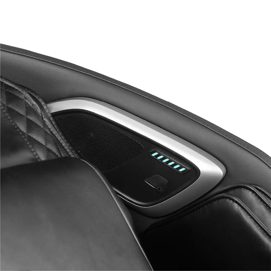 Osaki Trion Flex Duo 4D+3D Massage Chair in black. Close-up of headrest speaker with LED-lit voice control interface.