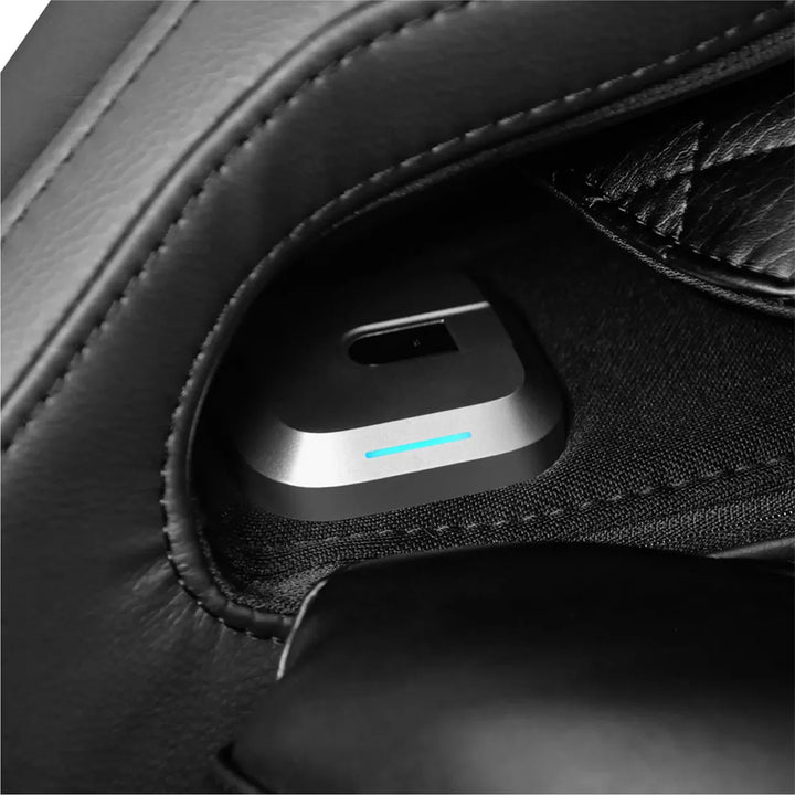 Osaki Trion Flex Duo 4D+3D Massage Chair in black. Detail of interior sensor for health tracking and smart scan features.
